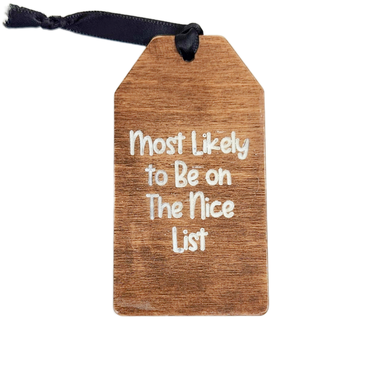 Wooden tag with text 'Most Likely to Be on The Nice List' and a black ribbon on a white background